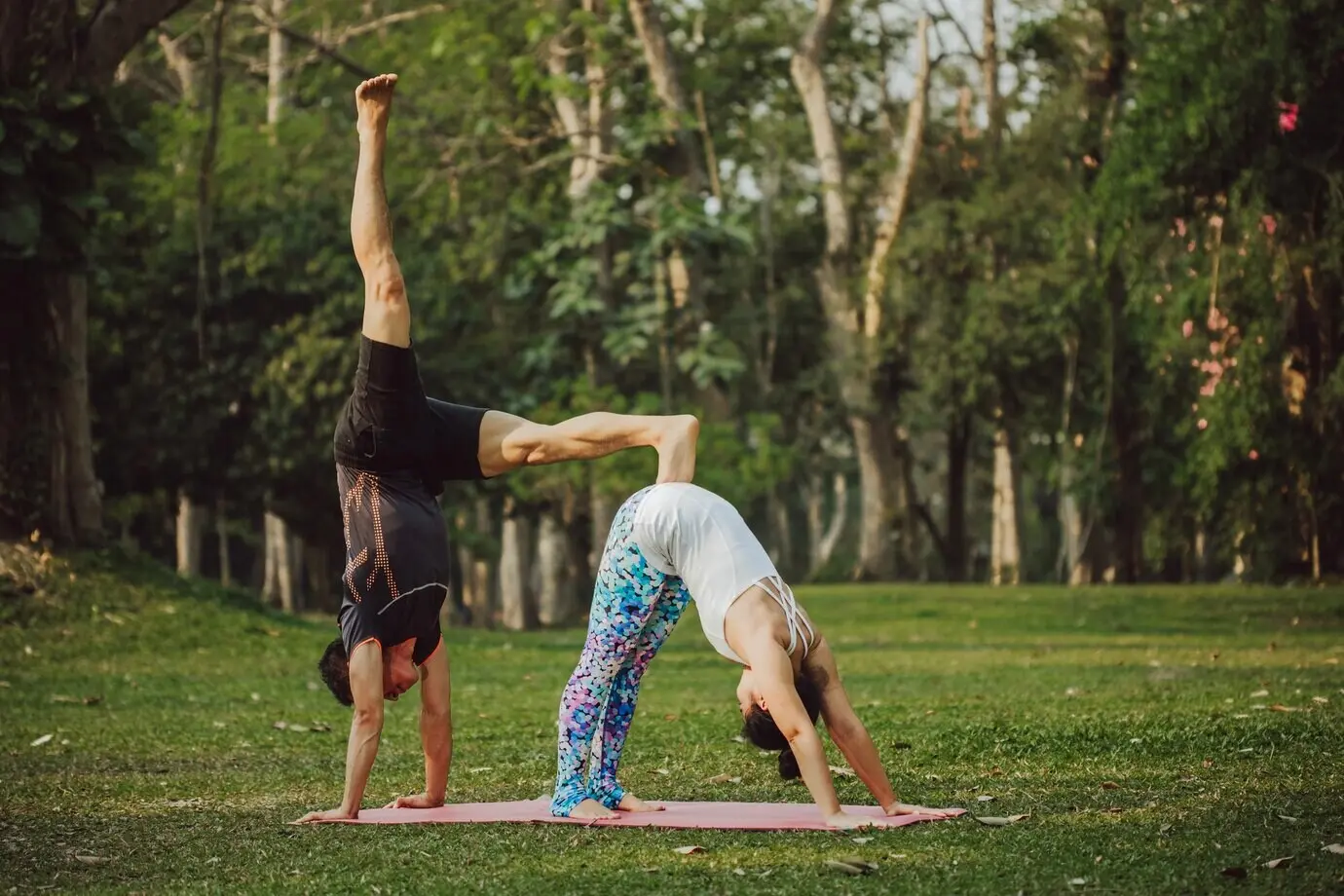 Couple in a professional yoga pose